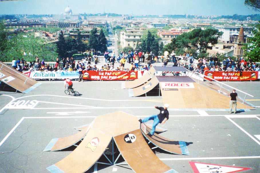 Scooter street course overview with skaters and BMX riders, built by SkateFacilities